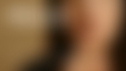 A close-up, landscape photo of a woman’s face, showing only the lower half. Her lips are slightly parted and naturally colored, with her index finger placed vertically over them in a classic "shush" gesture. The background is neutral, and the lighting is soft. Above her, bold white text reads "Silence" and below her, it says "The New Family Crisis." The image symbolizes the painful silence that has become a growing crisis within families, especially due to the increasing use of “no contact” as a response to unresolved conflict or trauma. The finger over the lips represents both enforced quiet and unspoken pain—hinting at a culture of avoidance rather than healing.