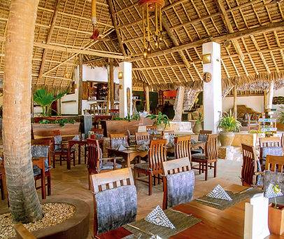 View of Zatiny Restaurant at Boutique Hotel Matlai Zanzibar with oceanfront seating.