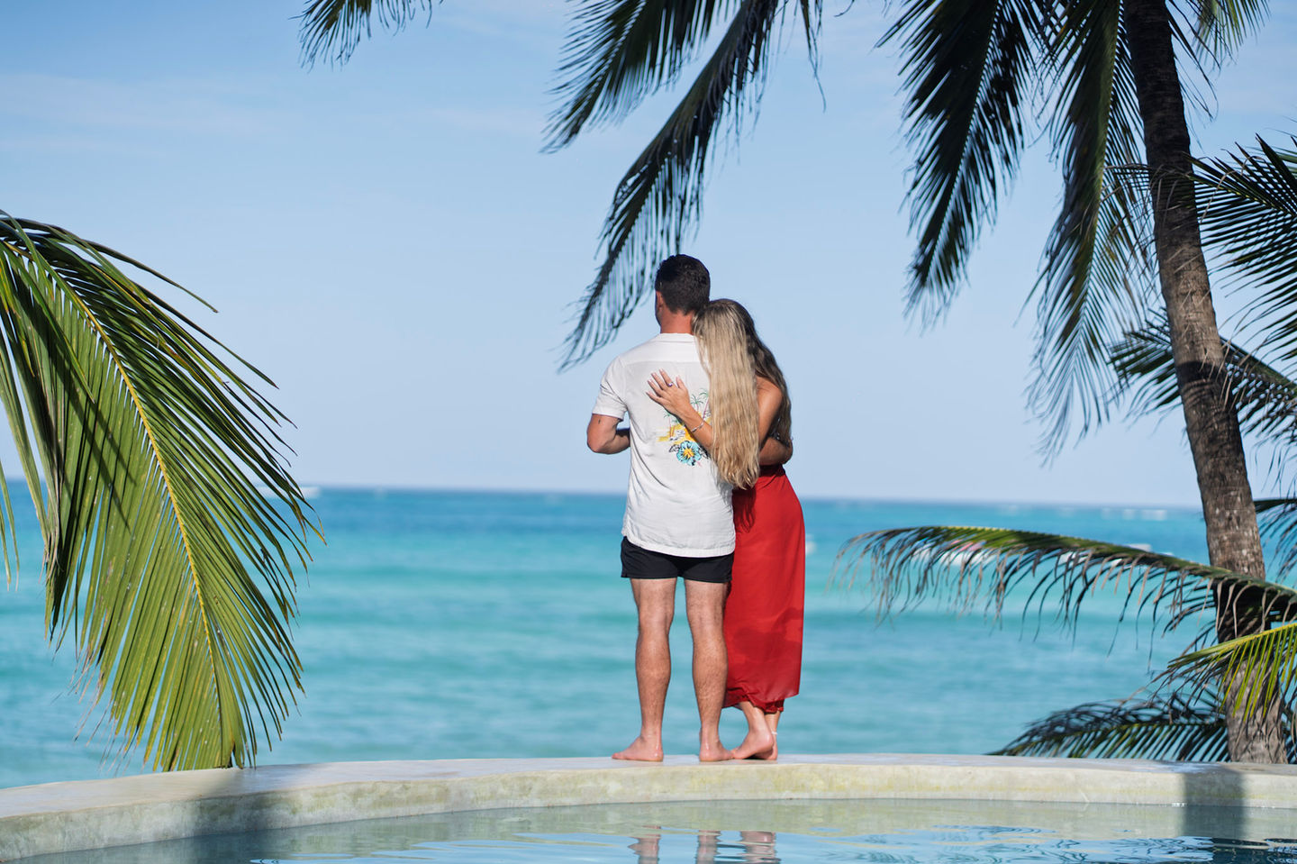 Couple at Pool Edge – Asili House Zanzibar