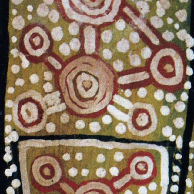 Peinture aborigène traditionnelle avec motifs symboliques circulaires représentant la mémoire et les connexions ancestrales