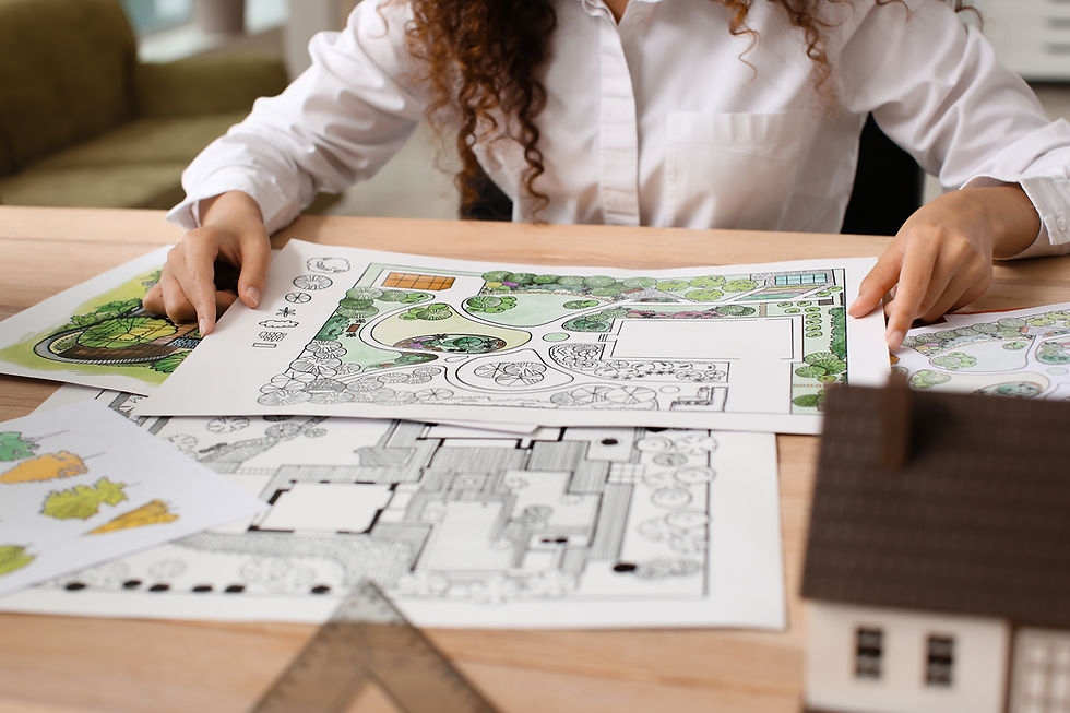 Municipal landscape architect in Ontario reviewing plans.