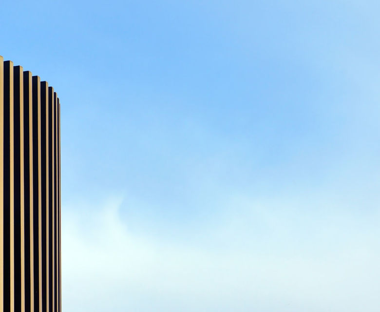 beige building under blue sky during daytime