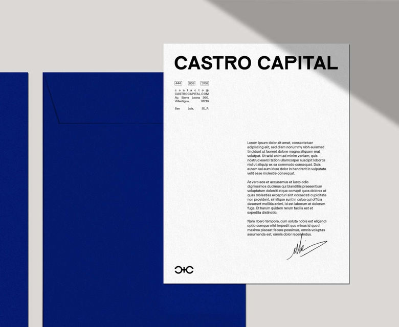 a blue book with a black and white logo on it