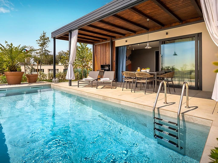Premium mobile home beside an outdoor swimming pool