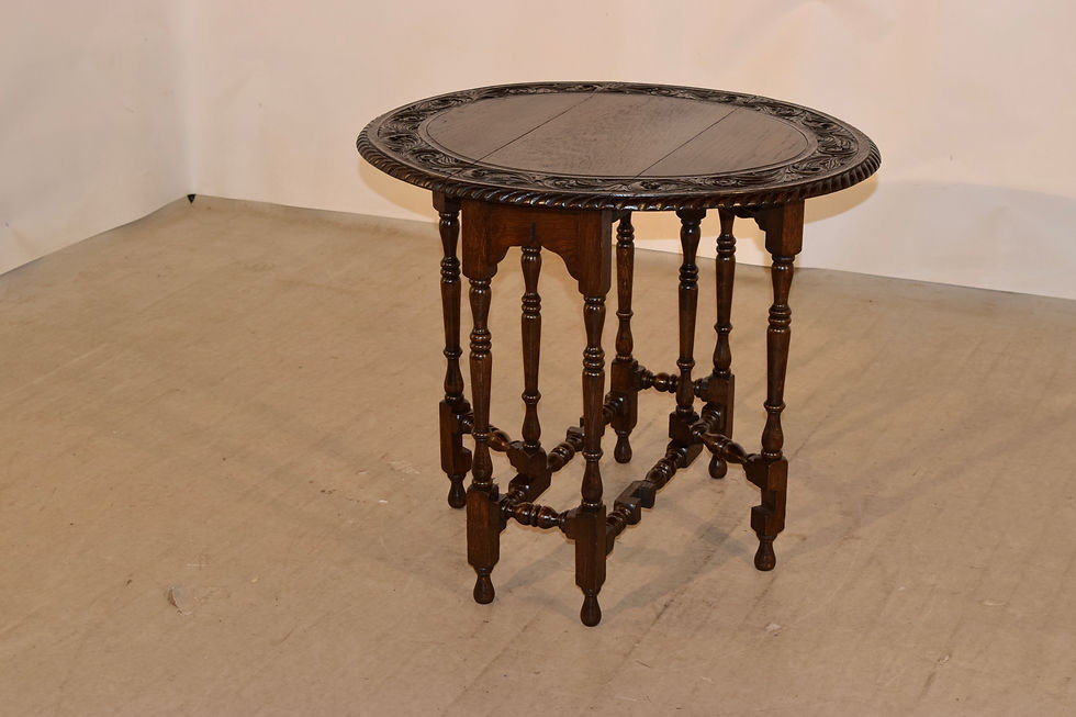 Thumbnail: 19th Century English Oak Carved Gate-Leg Table