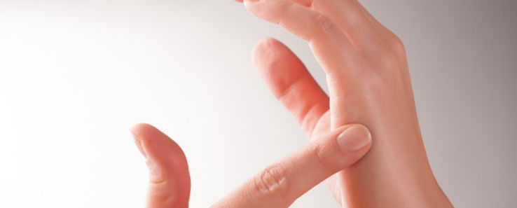 tapping fingers on hand