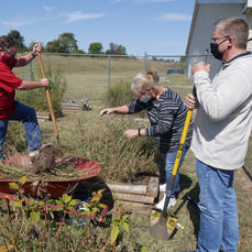 VOLUNTEERS SPRUCE UP FOR SPRING