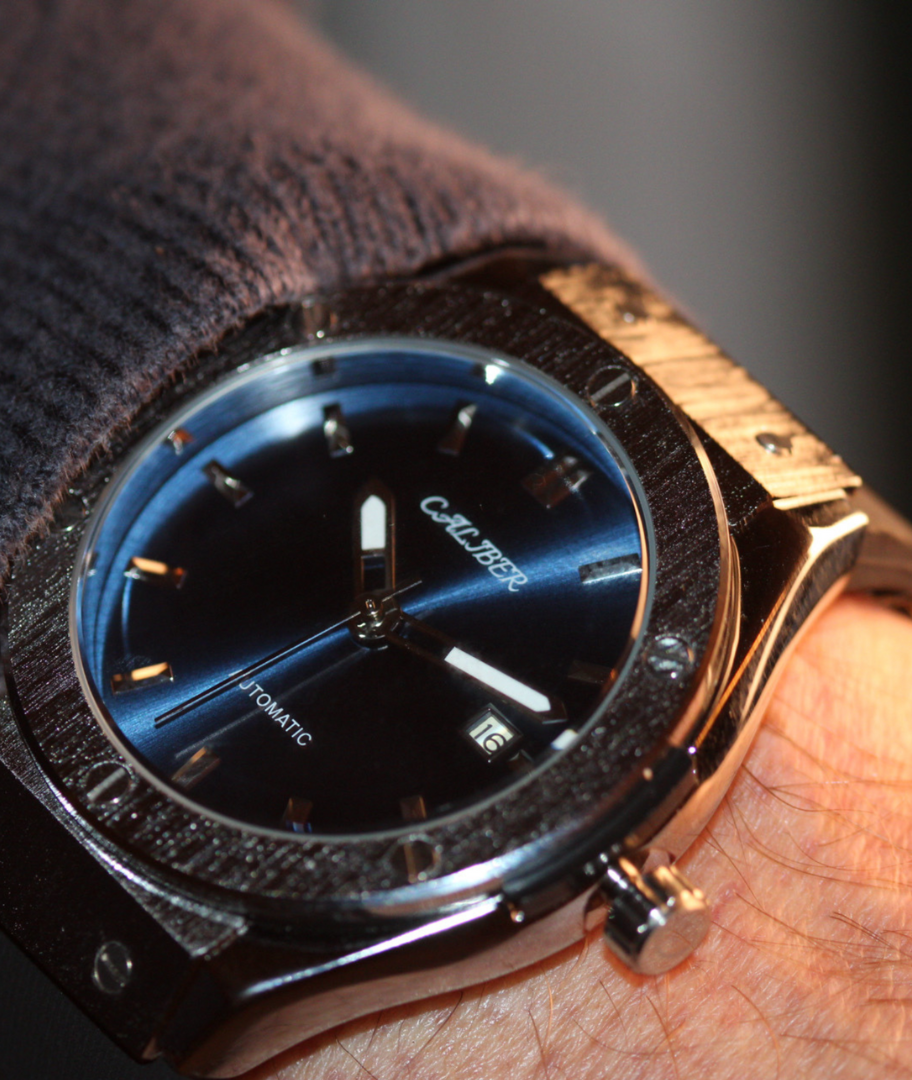 Caliber Watches Atlantic Inception - Luxury automatic watch with a deep blue dial and stainless steel case, elegantly worn on