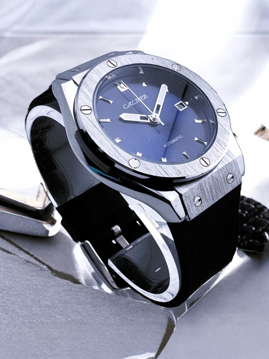 Caliber Watches Atlantic Inception - Luxury automatic watch with a deep blue dial, stainless steel case, and rubber strap.
