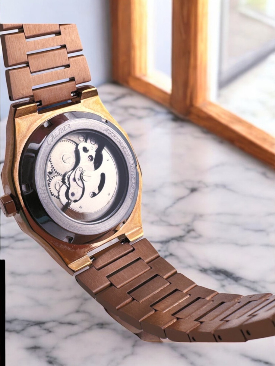 Caliber Watches Logo Dial – Rear view highlighting the intricate automatic movement and refined case engraving.