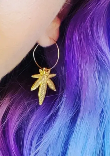 Thumbnail: Breezie Puffs cannabis leaf earrings