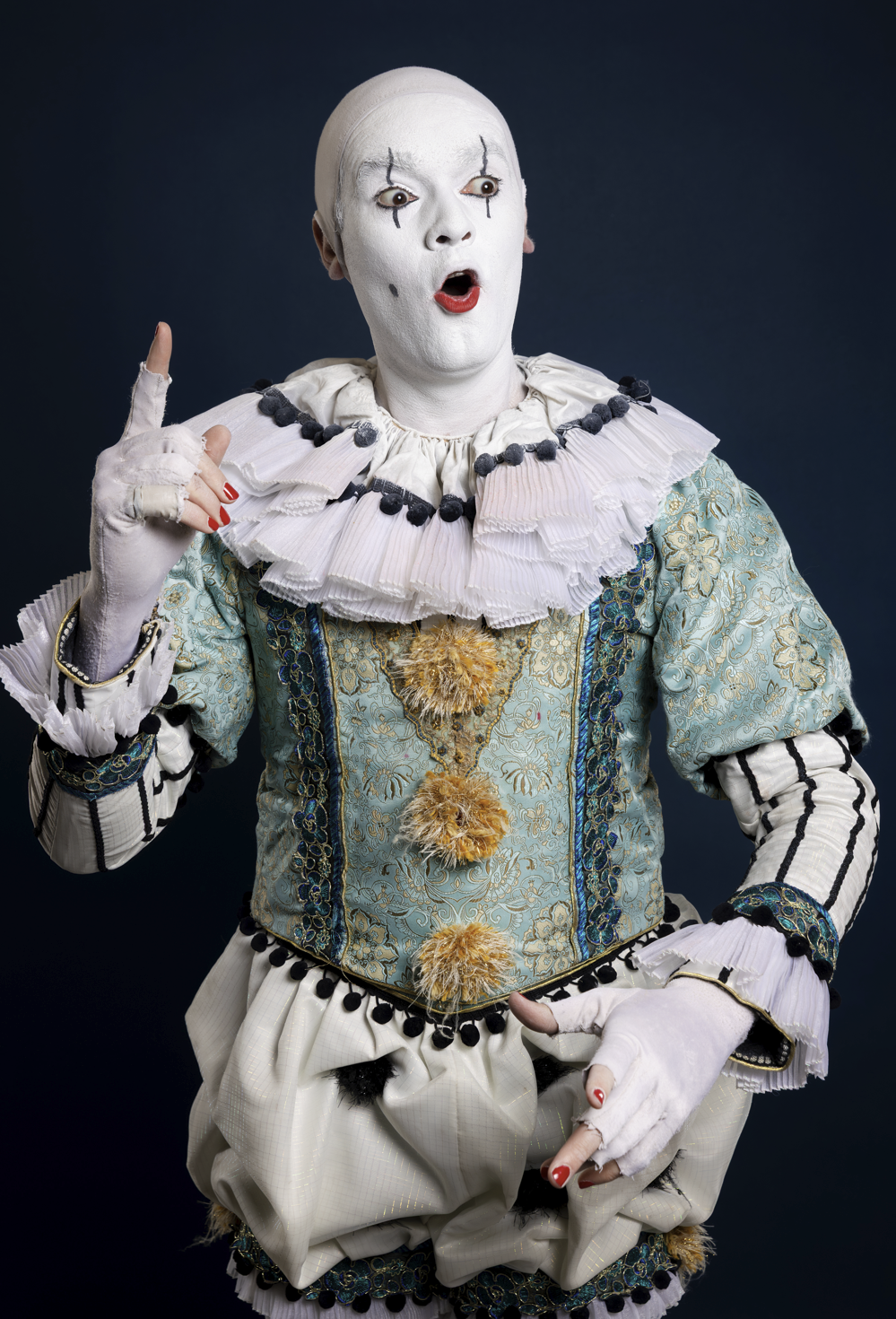 Clowning Through Collapse: Old God Confronts a World in Freefall