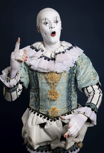 Clowning Through Collapse: Old God Confronts a World in Freefall
