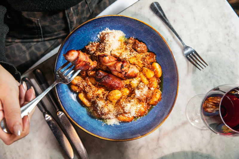 Soho’s 64 Old Compton Street Hands Out 100 Free Pigs in Blankets Ragu Portions This November