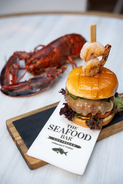Celebrate National Burger Day With A Coastal Twist at The Seafood Bar