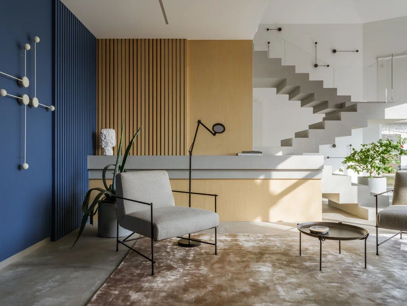 The House with a Soaring Staircase: A Vision of Light and Space by Makedesign Studio