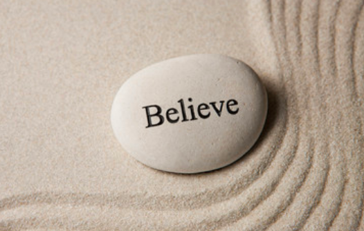 Pebble engraved with believe