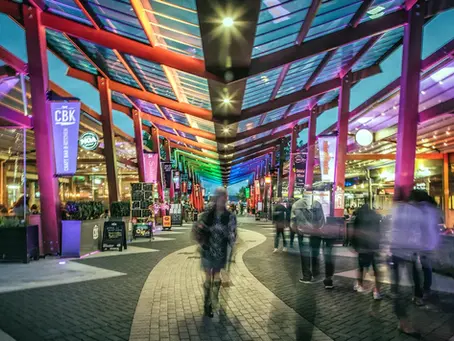 Eat Streat dining precinct in Rotorua, New Zealand, with multiple restaurants, outdoor dining and visitors enjoying the evening atmosphere.