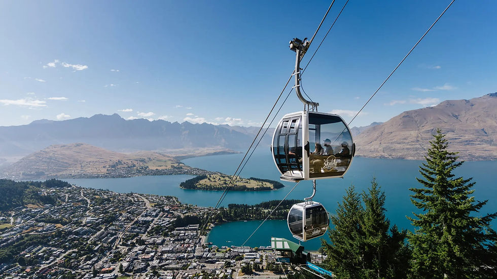 Thumbnail: Two cable cars ascend above a scenic Queenstown landscape, offering panoramic views of the town and Lake Wakatipu below.