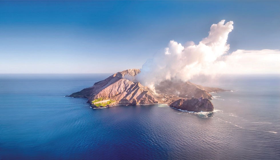 Thumbnail: Whakaari / White Island’s active volcanic caldera, with steam and volcanic clouds rising from the crater.
