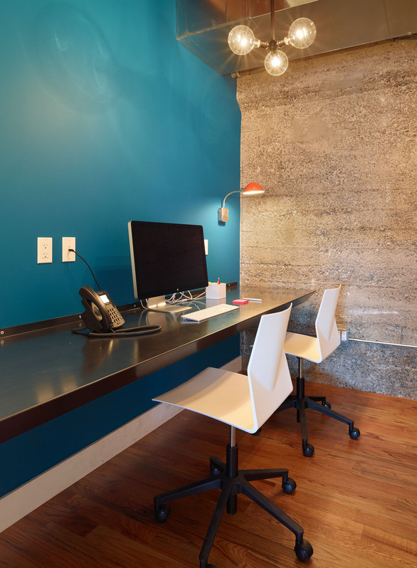 Thumbtack HQ open space planning informal meeting rooms with sliding glass doors. 
