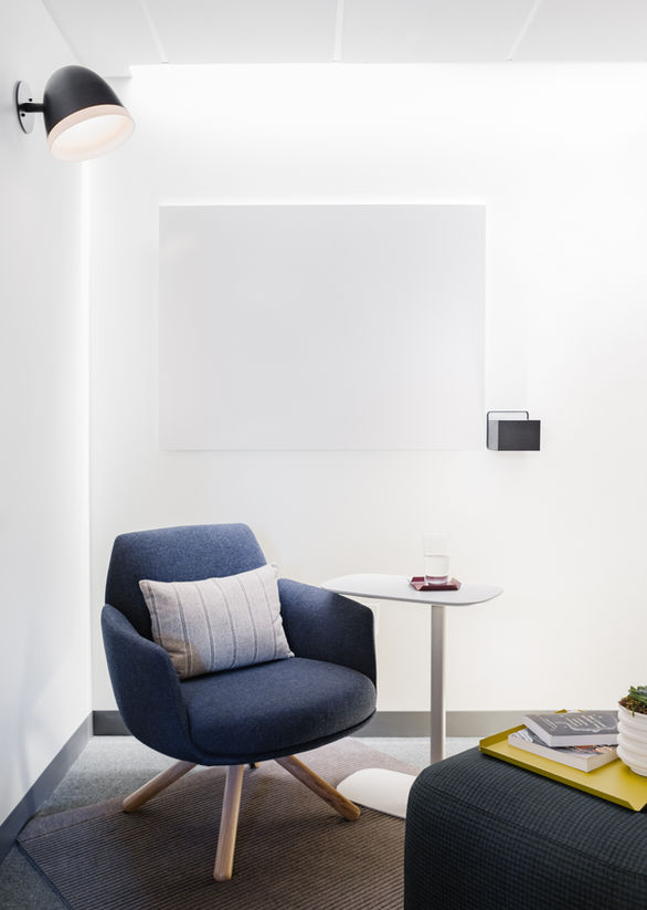 Checkr HQ Denver soft blue seating area and decorative lighting. 