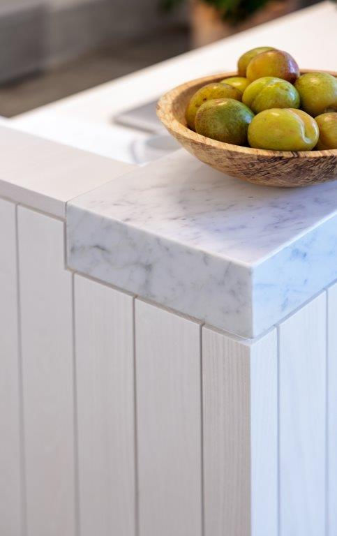 PlayStudios entrance front counter detail with bright white textures.
