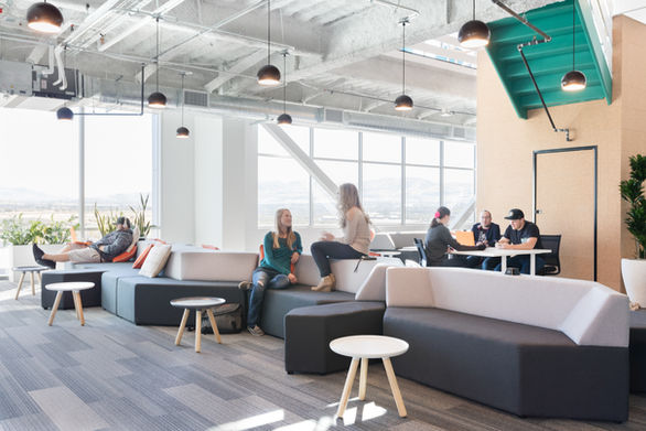 Thumbtack Utah open office areas gives a logic between social and introverted functions and sightlines to the beautiful setting with energetic color scheme and residential-inspired furnishing interiors.