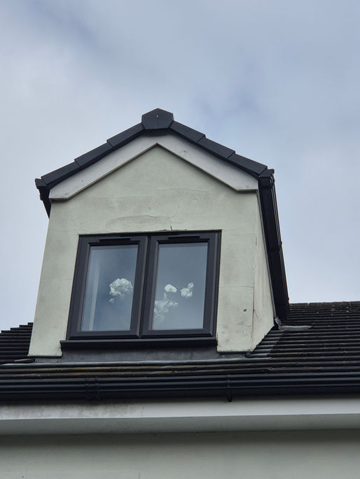 Domer cladding in composite