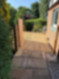 Decking leading on from patio to nice outdoor seating area