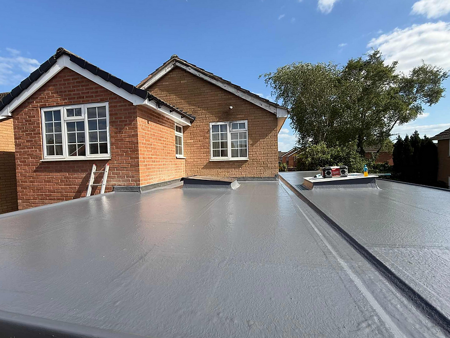newly installed flat roof on extension with skylights