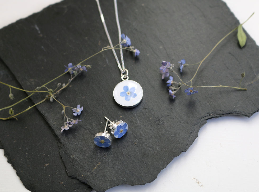 Thumbnail: Sterling silver circle necklace with real blue forget me not flower