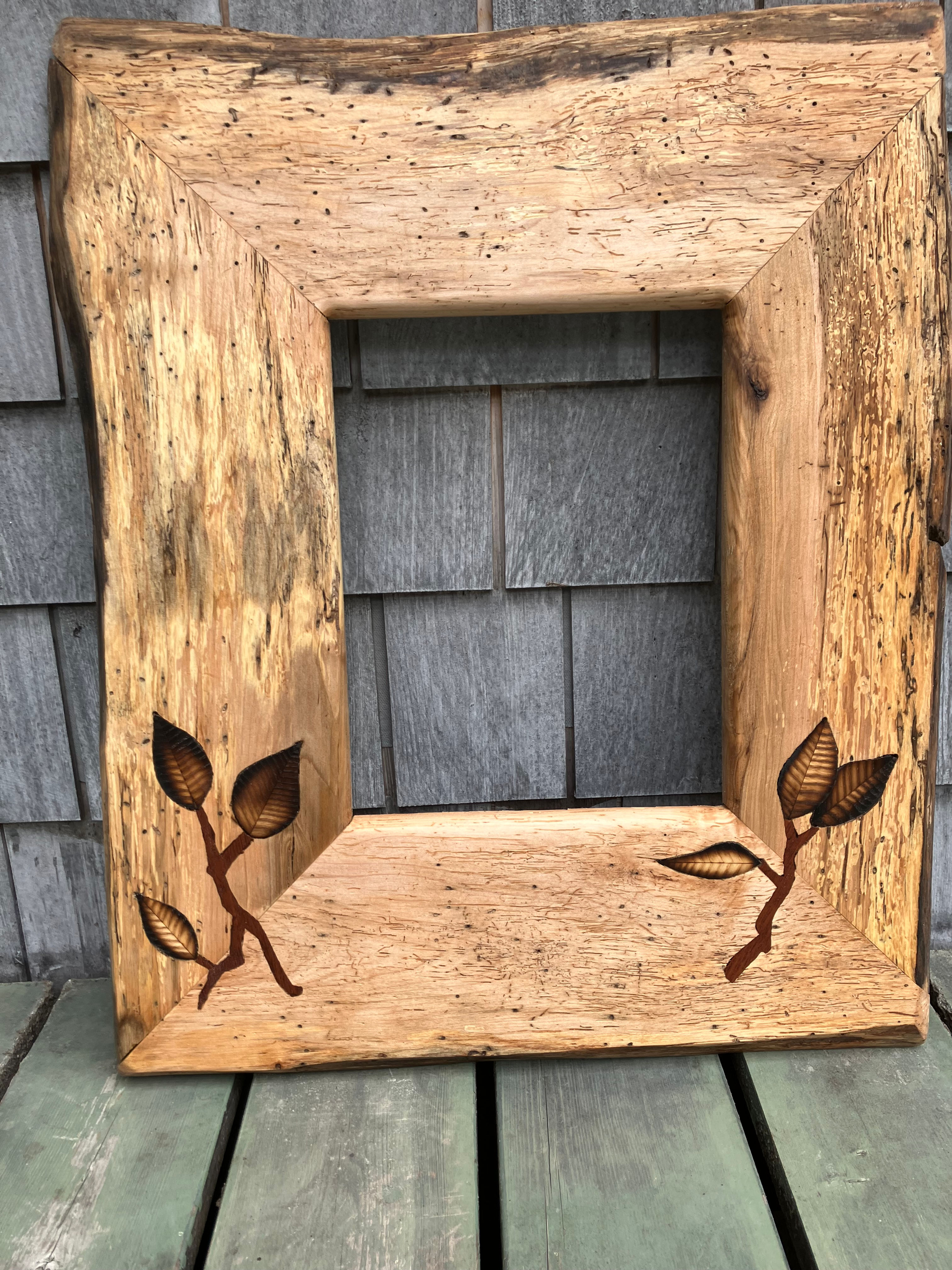 # 26.  Maple with leaf inlay. 24" X 20".