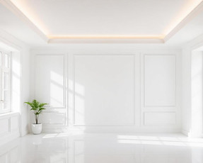 Intérieur rénové lumineux avec murs et plafonds finis, espace moderne après travaux de peinture et plâtrerie