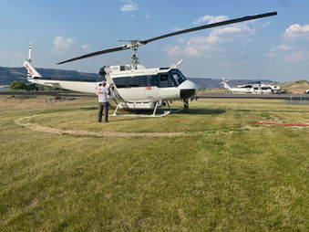 Mobile maintenance units and fuel trucks in remote location in support of HP Helicopter's fleet.