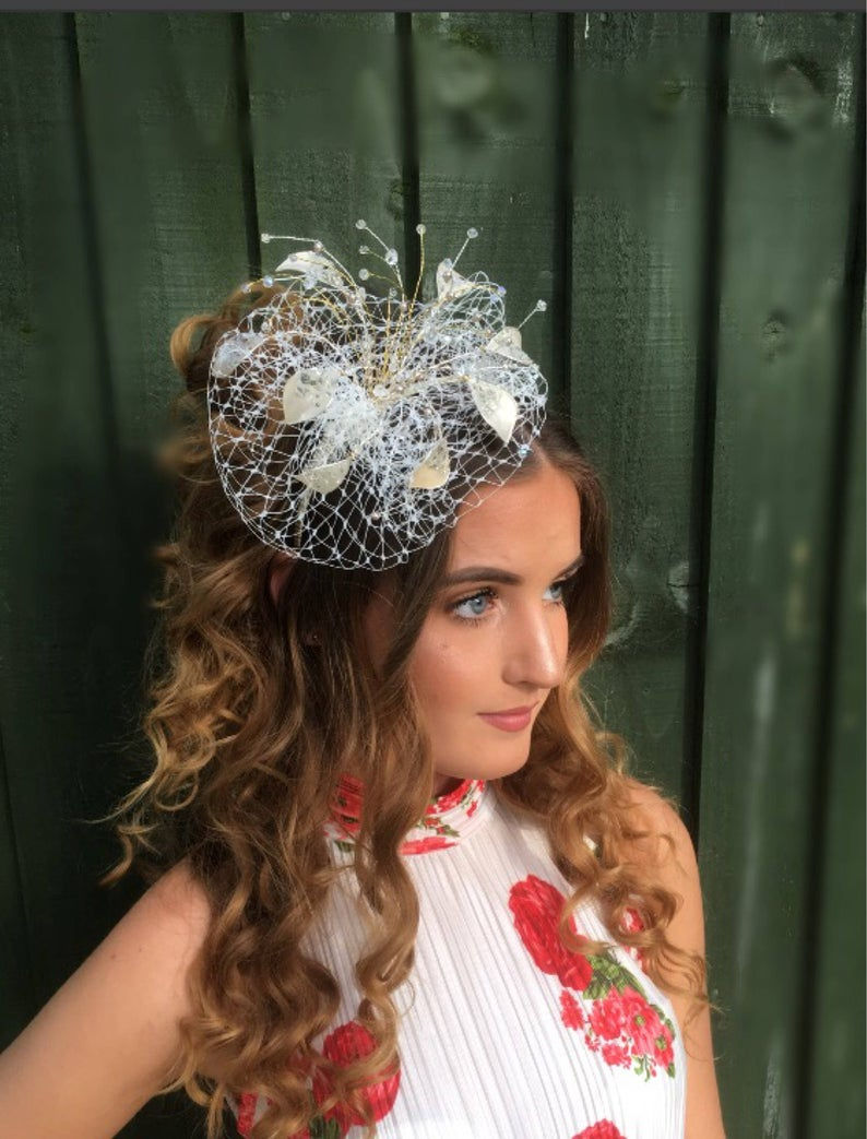 Silver veiled fascinator