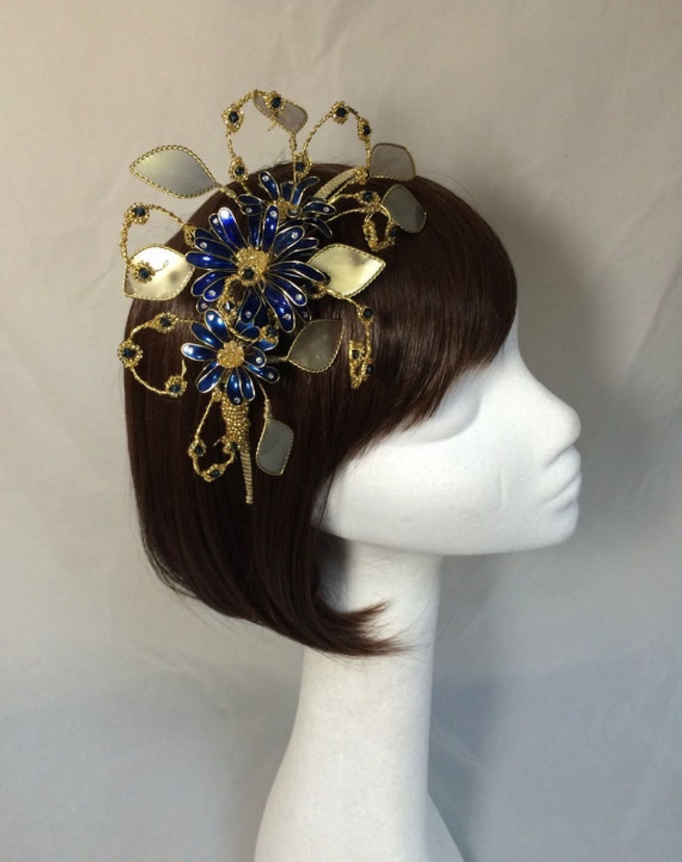 Thumbnail: Navy and gold fascinator
