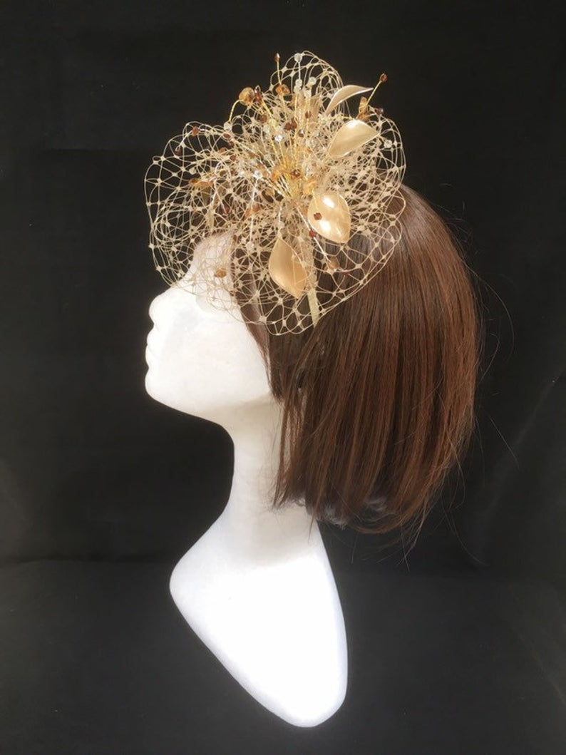 Thumbnail: Gold veiled fascinator 65