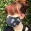 Thumbnail: Black daisy print face mask