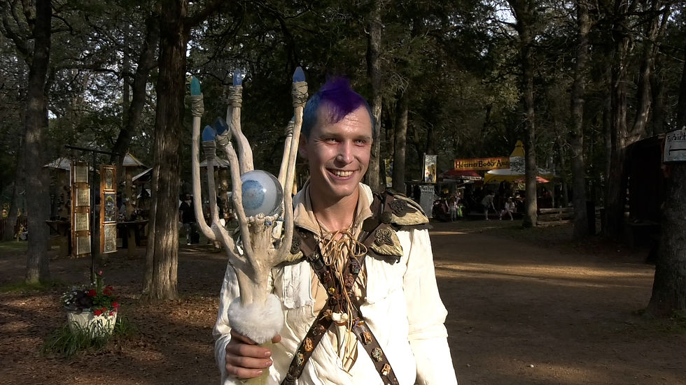 Mitchell Goss dresses as an alchemist at the Sherwood Forest Faire in McDade, Texas, on March 23, 2024. He said he’s been coming for five years. (Haley Pacheco/Reporting Texas TV)