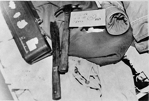 Black and white law enforcement photograph documenting items collected as evidence during the Keddie Cabin Murders investigation