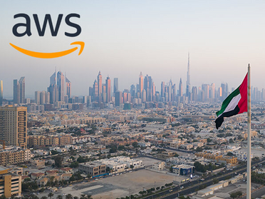 The Amazon Web Services (AWS) logo displayed over a dark, blurred background, symbolizing the severe cloud service outages caused by recent missile strikes in the Middle East.
