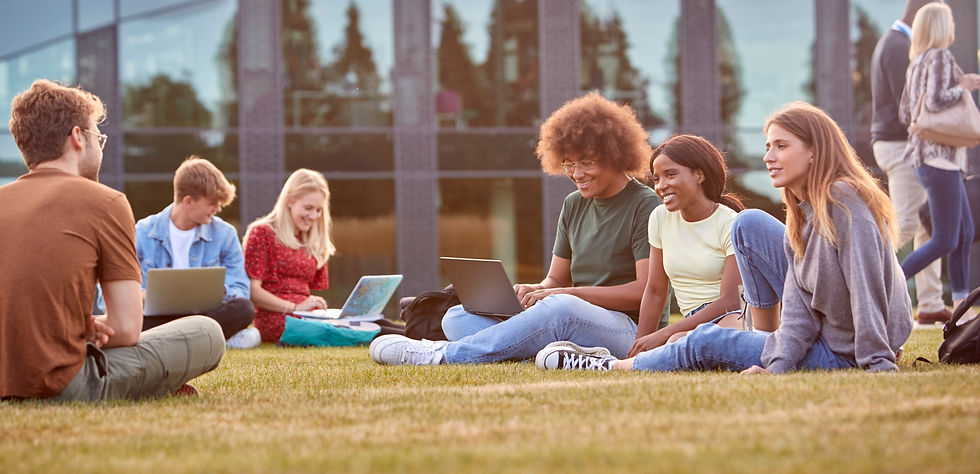 group-university-college-students-sit-grass-outdoors-campus-talking-working.jpg