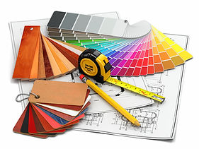 Color swatches, tape measure, and pencil on blueprints