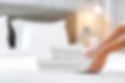 white towels and bed linens