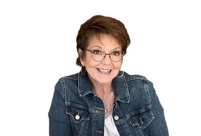 Raini wearing glasses and a denim jacket.