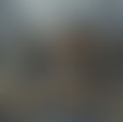 12 people drumming in a snowy scene