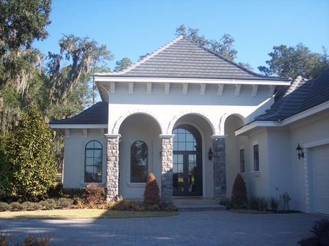 Stucco and brick installation on a Florida home exterior