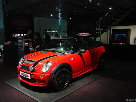 Why did MINI choose the name John Cooper Works (JCW)?