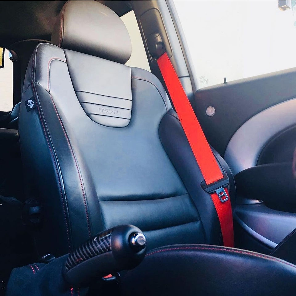 Image of a customers red seatbelt